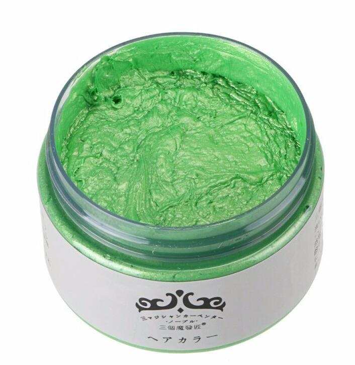 Green one-time hair color wax in open container for temporary hair dyeing