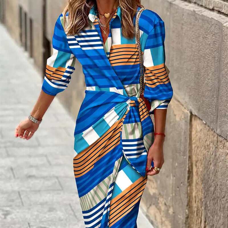 Fashionable blue printed shirt dress with belt, three-quarter sleeves, and stylish design for women.