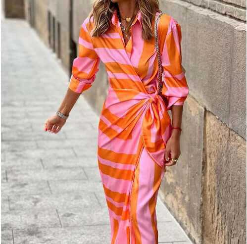 Fashion printed shirt dress in pink and orange stripes, featuring a belt and three-quarter sleeves, perfect for stylish women's clothing.