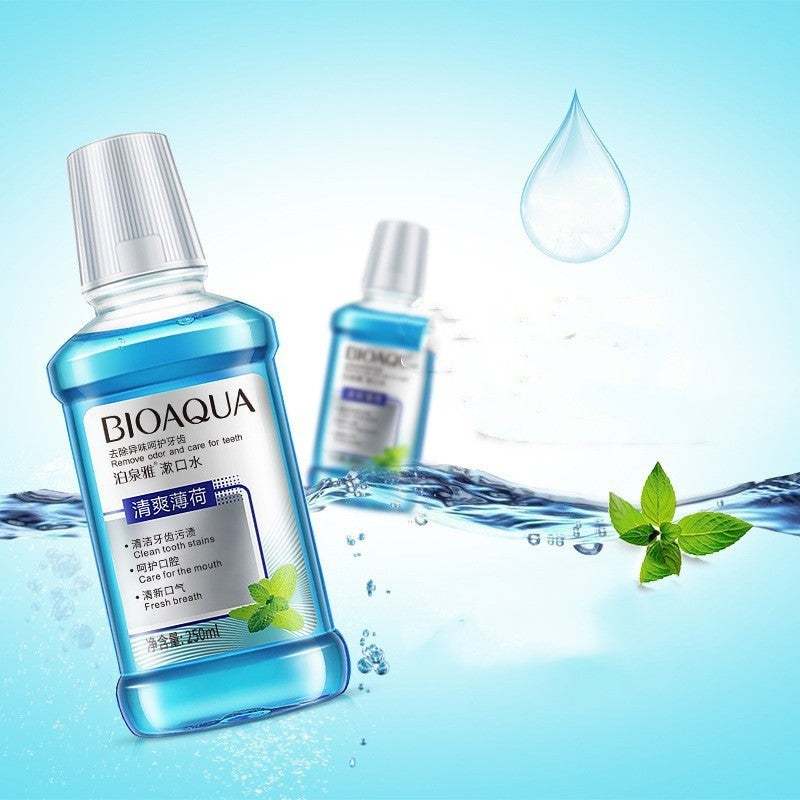 Quick Cleanse Pocket-Sized BIOAQUA mouthwash bottle with mint leaves and water splash background
