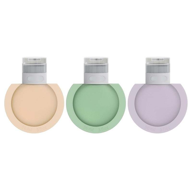 Set of three silicone refillable travel bottles for shampoo and lotion in pastel colors