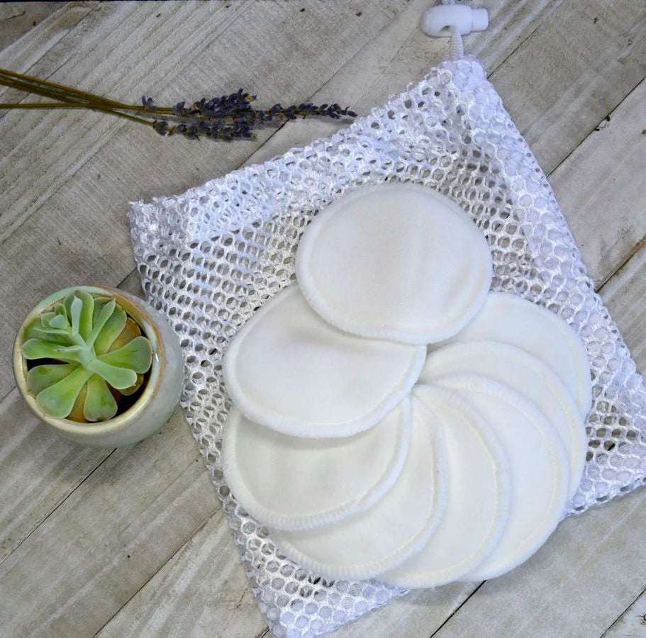 5-pack reusable eco facial rounds pads in a mesh bag with a small plant, perfect for sustainable makeup removal.