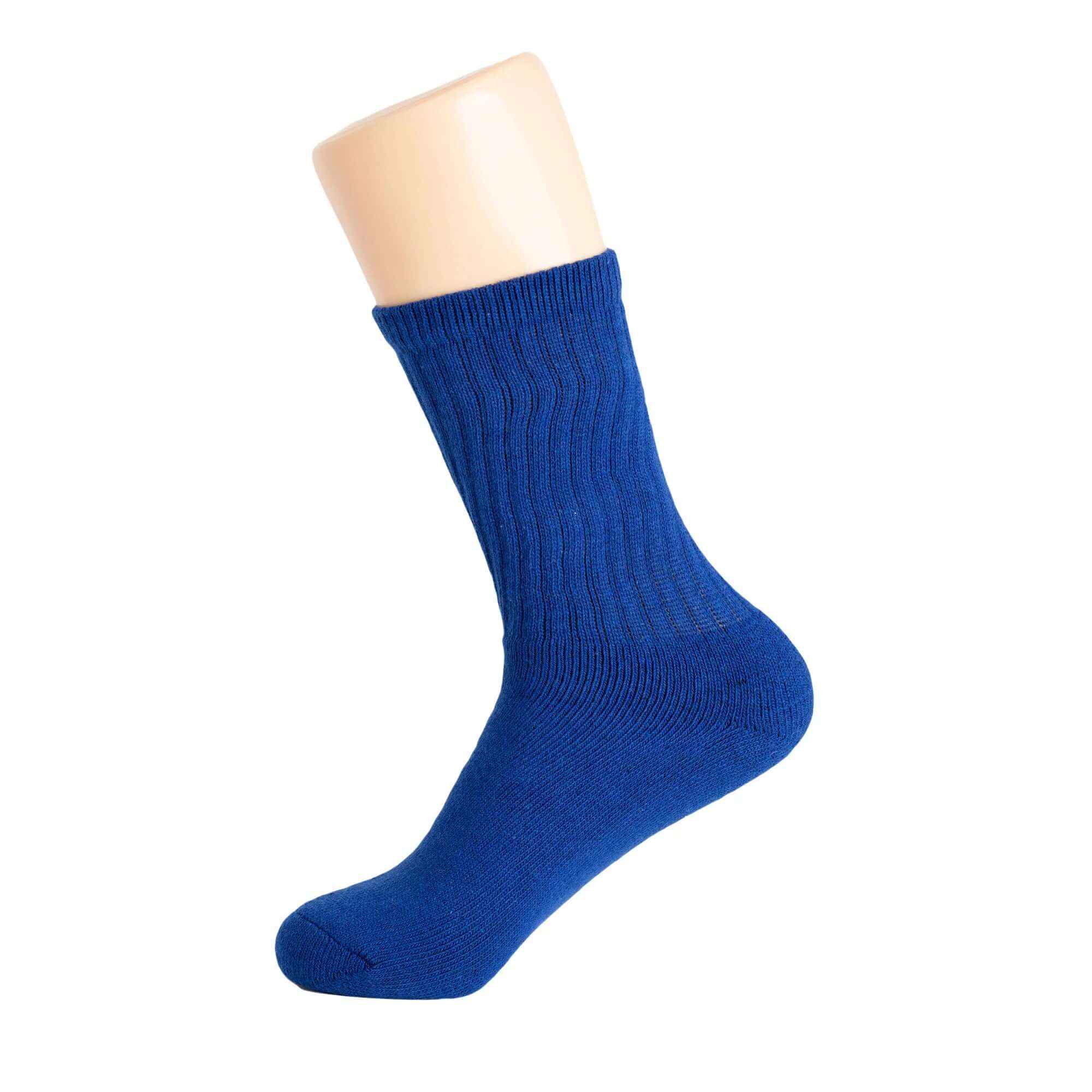 Royal blue cotton women's crew sock displayed on a mannequin foot, showcasing its ribbed design and comfort features.