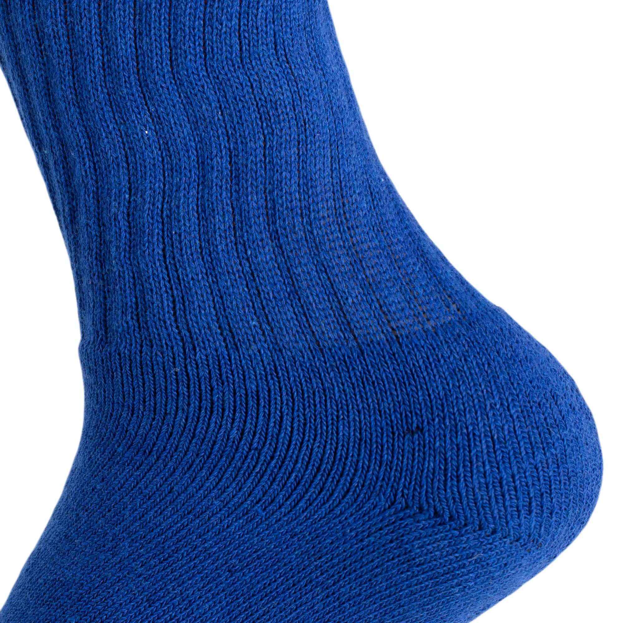 Close-up of a royal blue cotton crew sock showing smooth texture and ribbed design for comfort and durability.