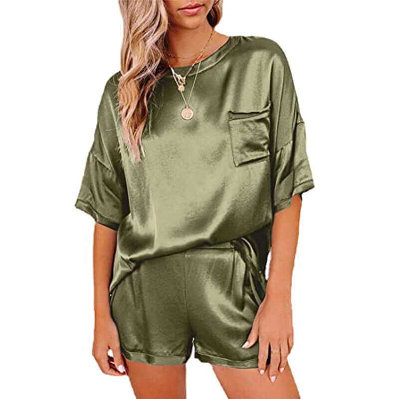 Olive green short sleeve pajama set for women, featuring a relaxed fit T-shirt and drawstring shorts.