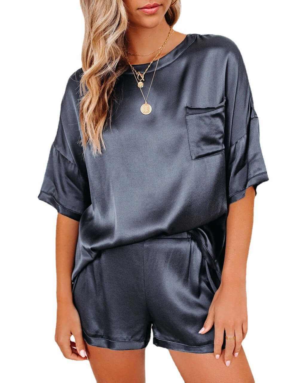 Short sleeve silk pajama set for women in navy blue, featuring a relaxed T-shirt and shorts for comfortable sleepwear.