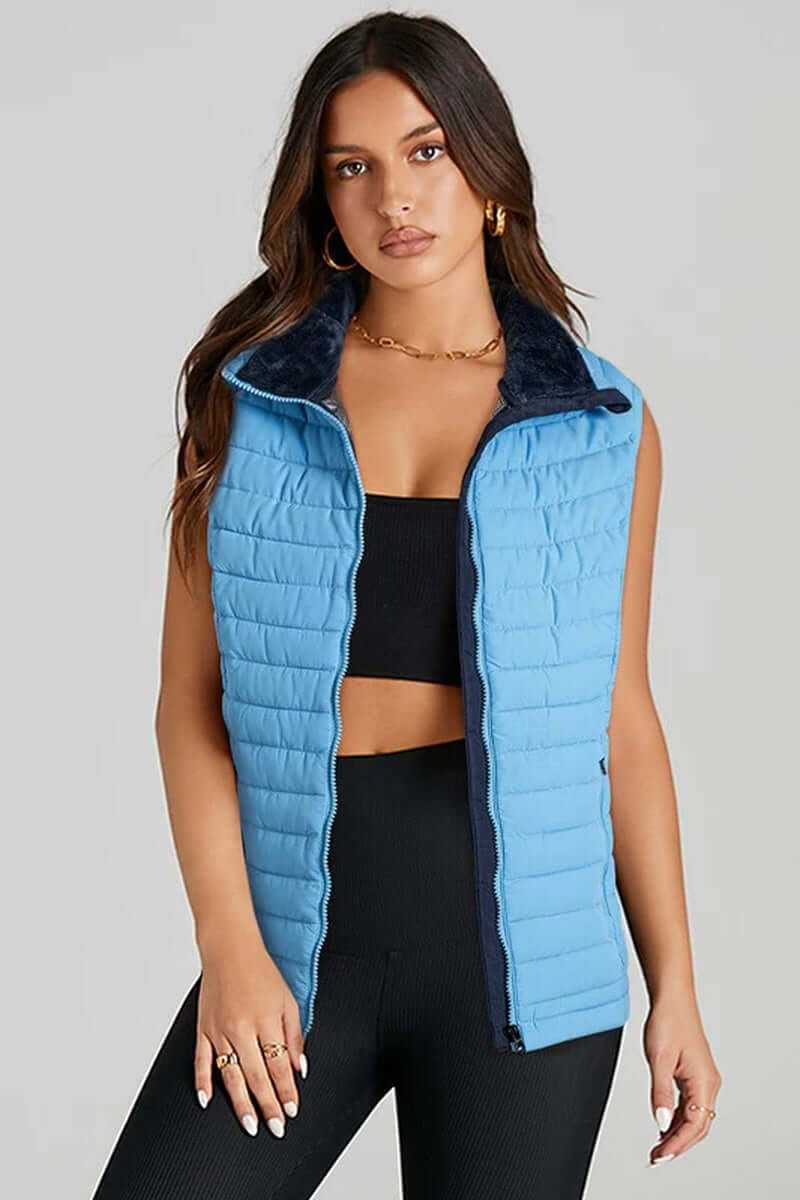 Sky blue plush collared quilted zipped puffer vest for women, perfect for layering and stylish warmth.