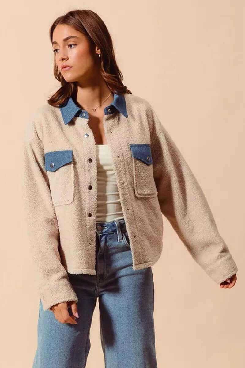 Model wearing SO ME Faux Sherpa Fur Shacket with Denim Collar, featuring cozy fabric and stylish design for cold weather.