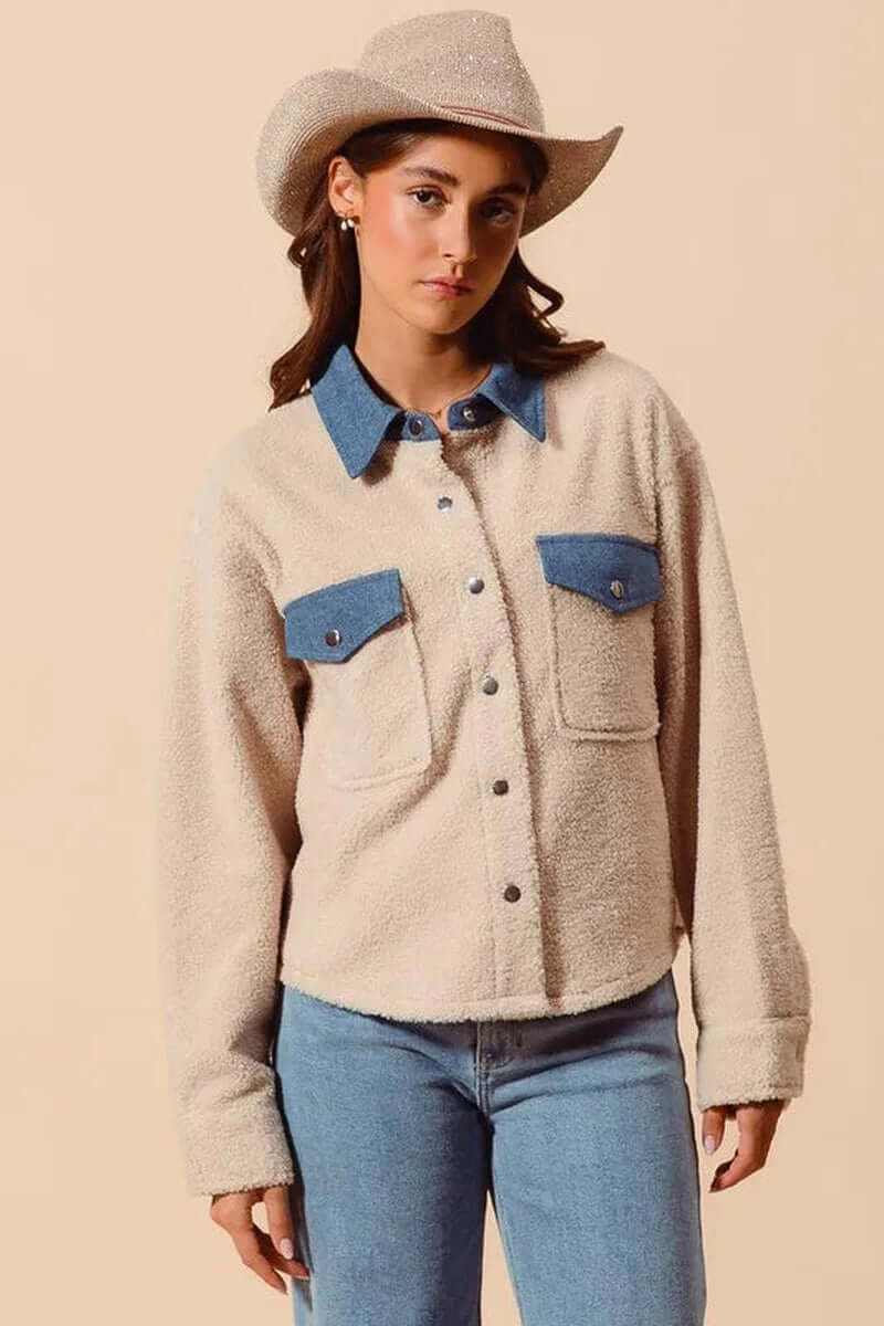 Model wearing SO ME Faux Sherpa Fur Shacket with Denim Collar, styled with a cowboy hat and casual jeans.