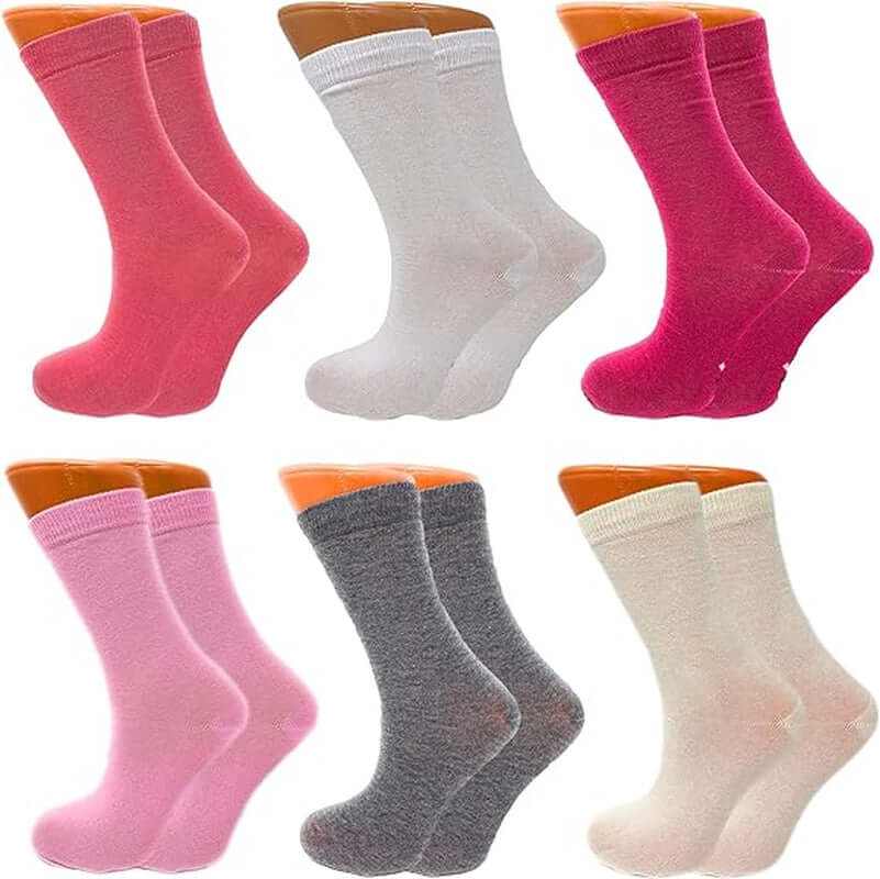 Six pairs of colorful women's crew socks made from soft breathable combed cotton for all-day comfort.