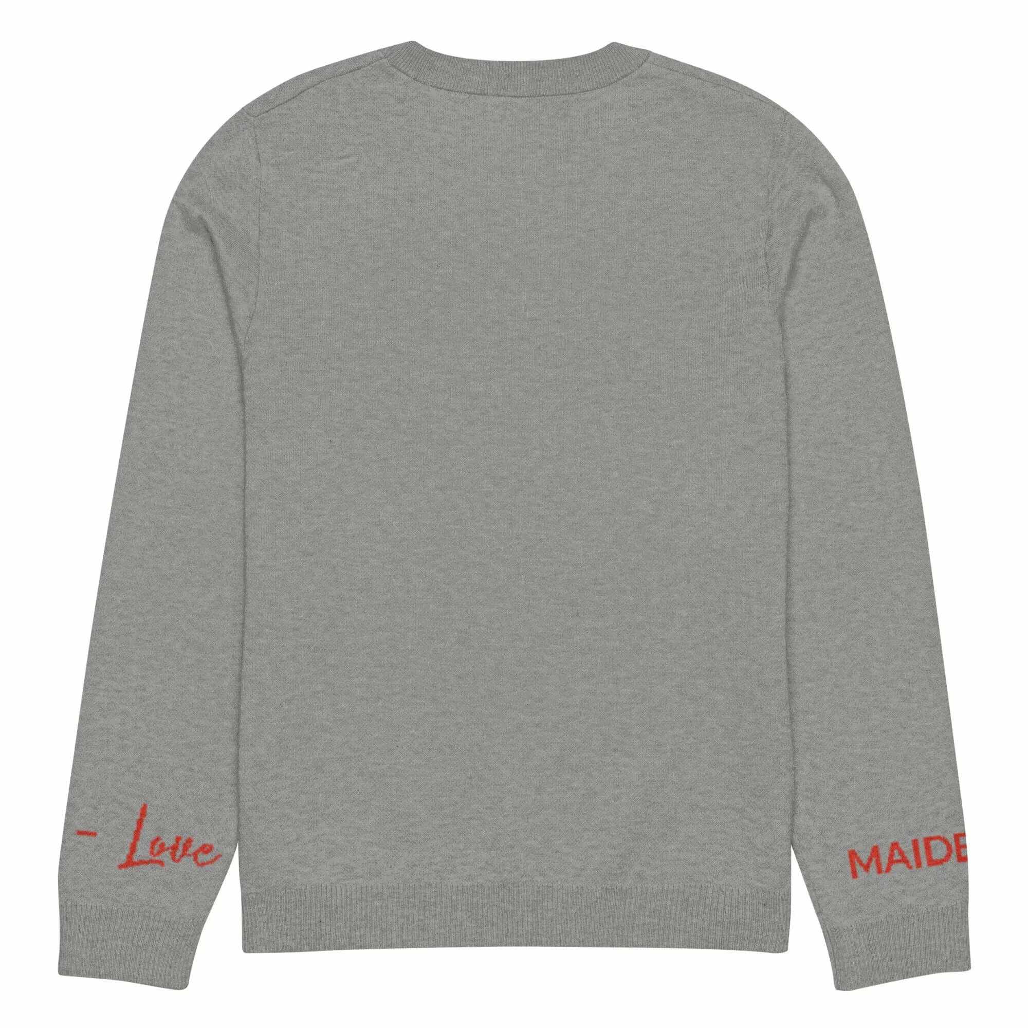 Back view of soft grey crew neck sweater featuring red text on sleeves, showcasing a cozy design perfect for layering.