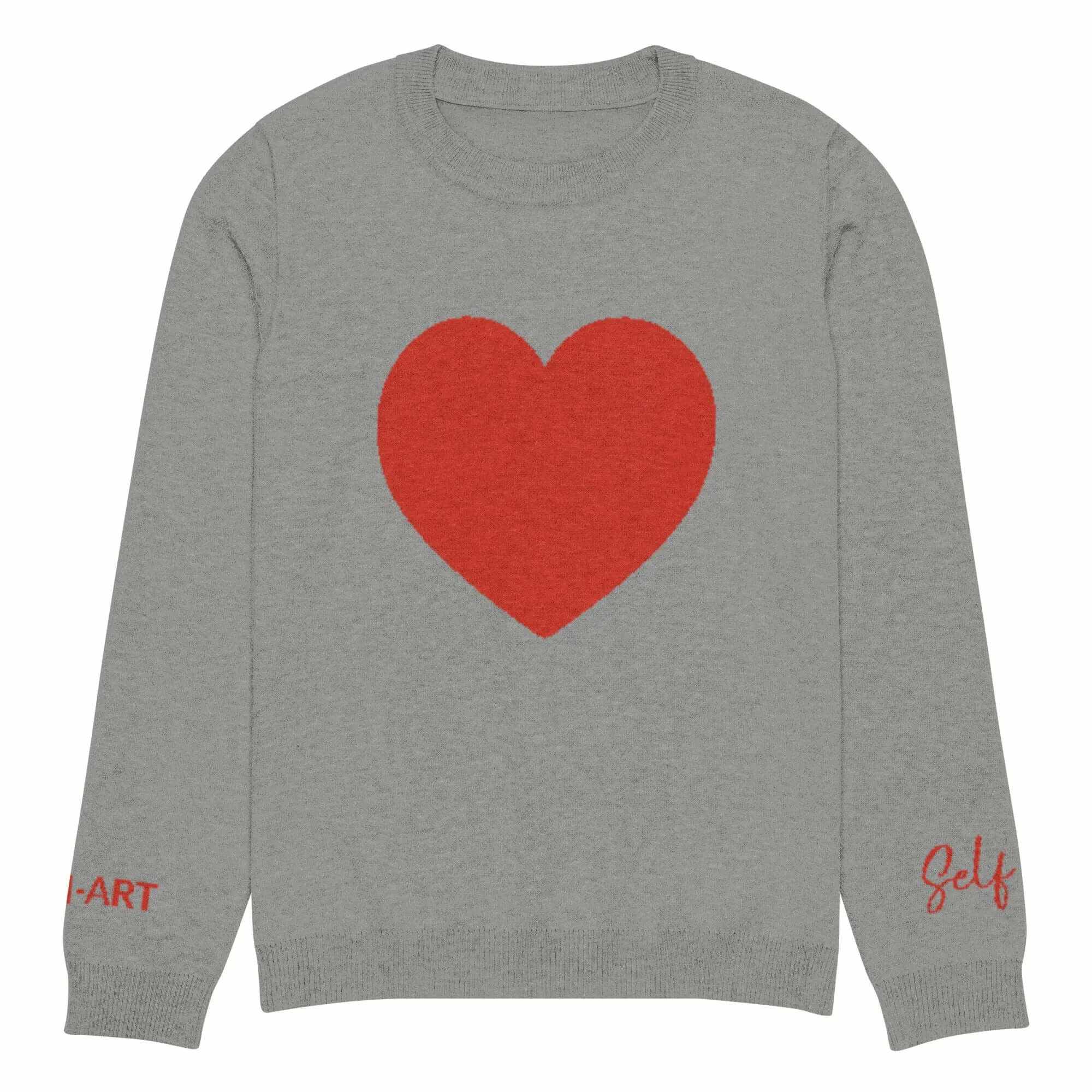 Soft grey crew neck sweater with a large red heart design, featuring 'Self' and 'Art' text on the sleeves.