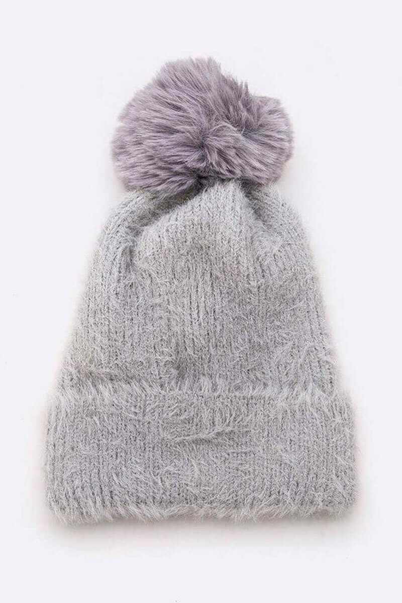 Soft cozy gray mohair beanie with fluffy purple faux fur pom, perfect for stylish winter warmth.