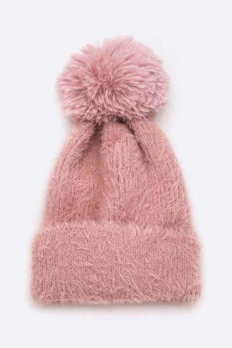 Soft cozy mohair faux fur pom beanie in pink, perfect for stylish winter warmth and comfort.