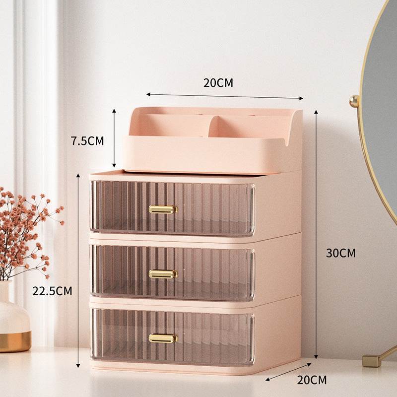 Pink space-saving vanity storage box with three drawers and top compartments, measuring 30cm high and 20cm wide