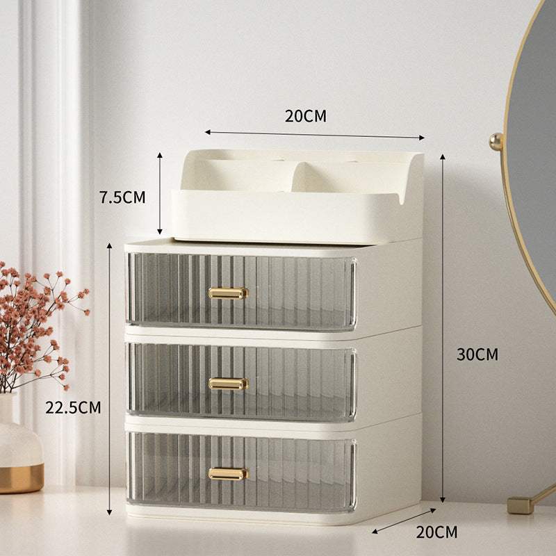 White space-saving vanity storage box with three drawers and pen holder compartments, measuring 30x20x22.5 cm.