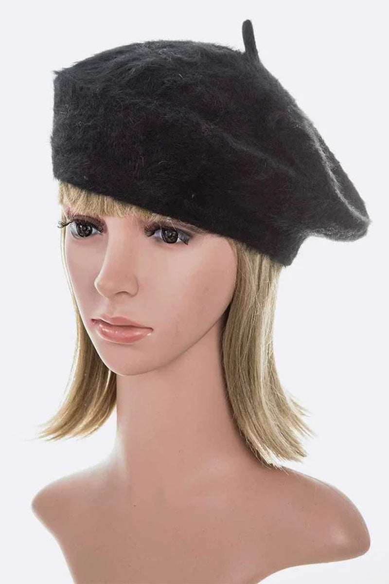Stylish black faux fur beret displayed on a mannequin with blonde hair, perfect for winter fashion.