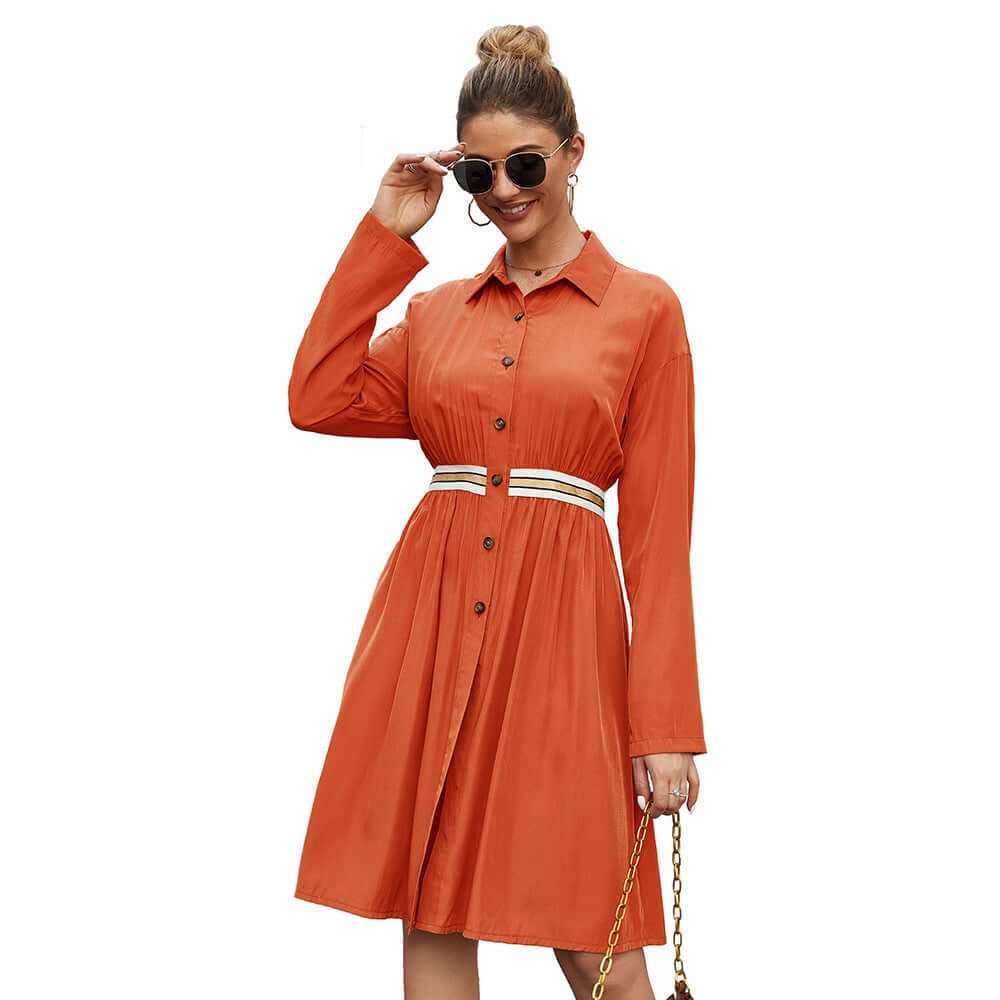 Casual mid-length A-line summer dress for women in orange, featuring a lapel collar and elastic waist, perfect for stylish outings.