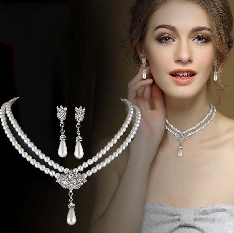 Elegant European wedding jewelry set featuring double pearl necklace and drop-shaped earrings with intricate alloy detailing