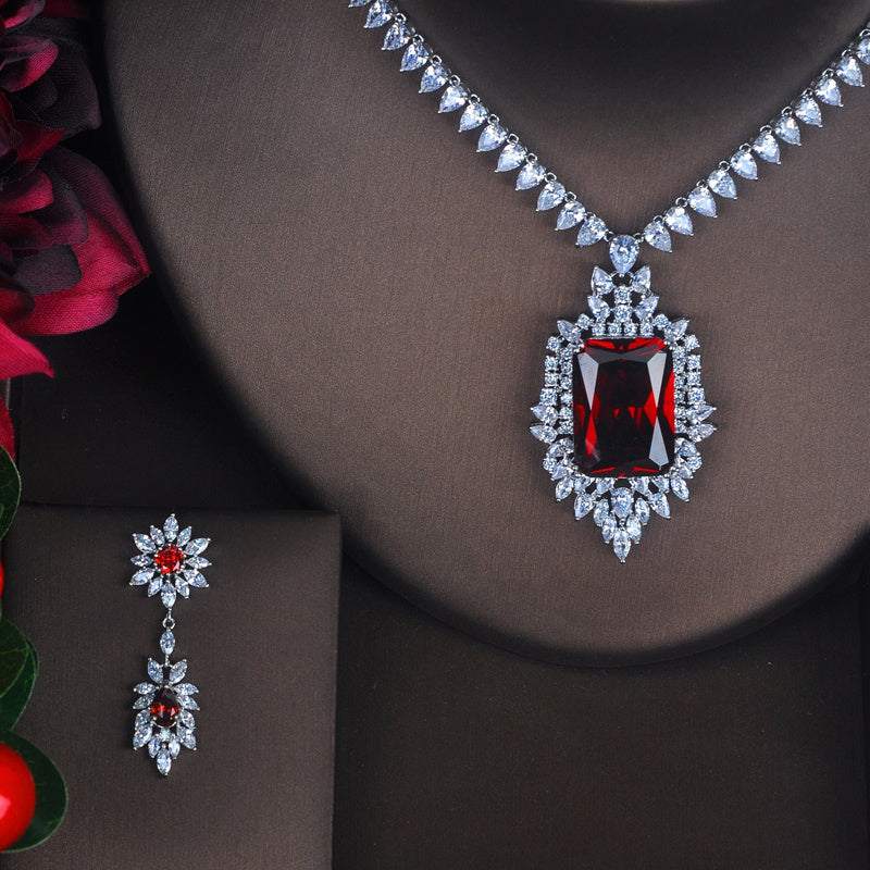 toast-inspired jewelry set with red gem pendant necklace and matching earrings