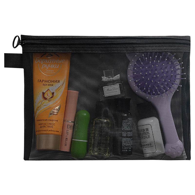Black transparent mesh makeup organizer bag with zipper and assorted cosmetic items inside for travel and storage
