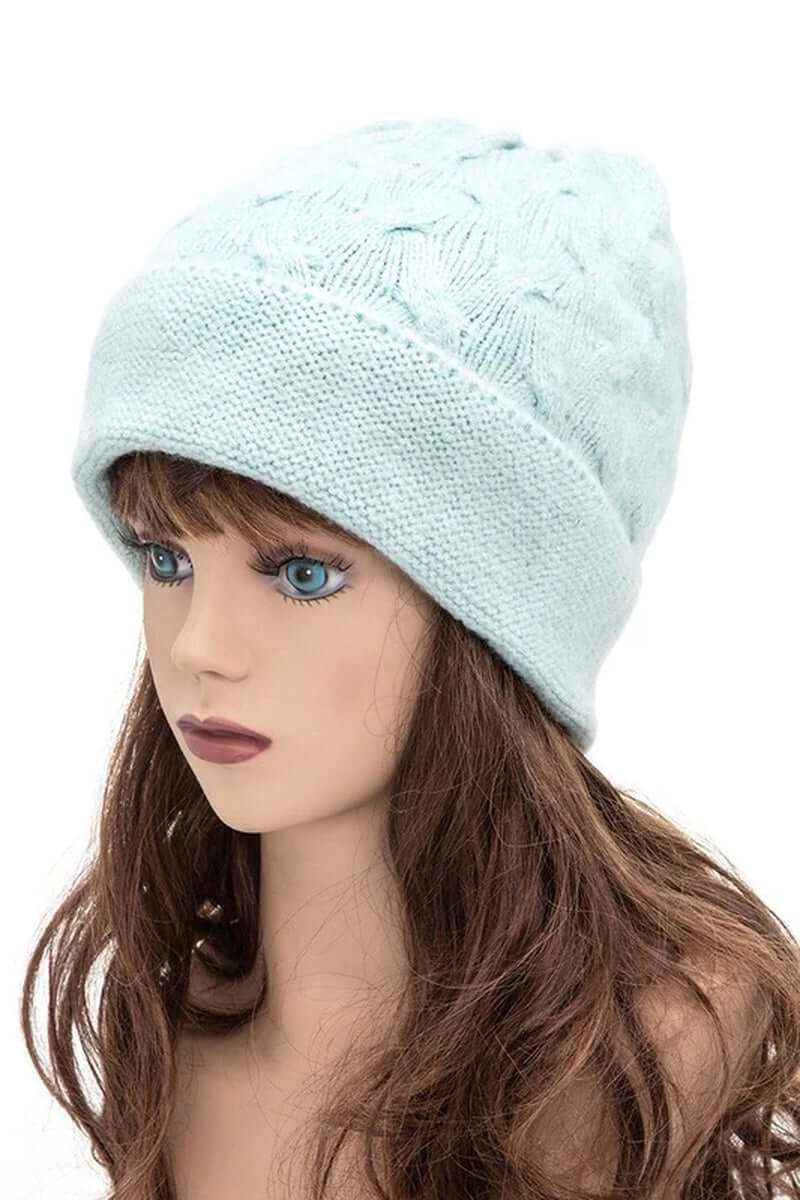 Light blue unisex slouchy fit soft knit beanie displayed on a mannequin, perfect for winter fashion.