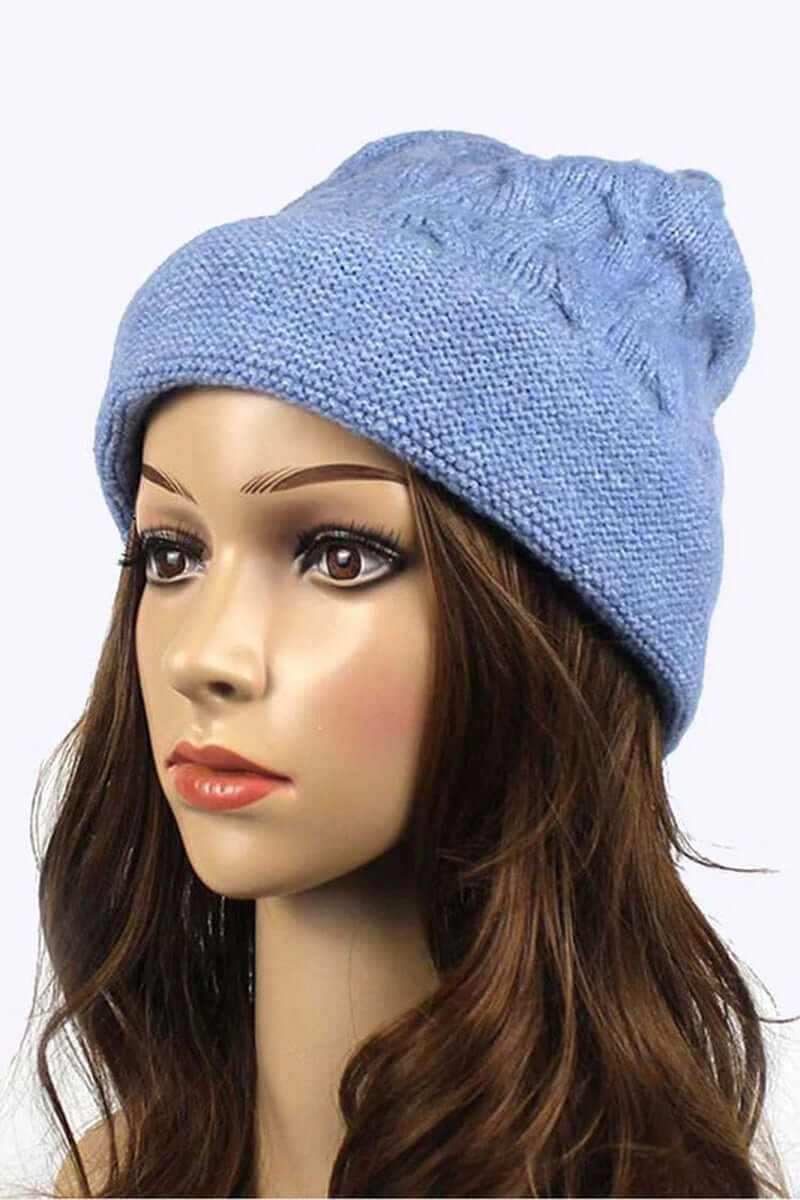 Unisex slouchy fit soft knit beanie in light blue, ideal for winter style and comfort.