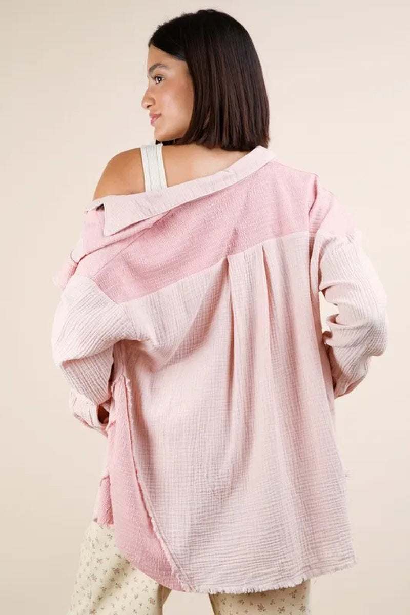 Model wearing a pink mineral washed oversized gauze shacket, showcasing its relaxed fit and lightweight texture.