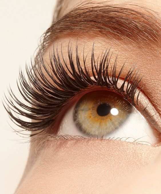 Close-up of eye with long, voluminous lashes using Volumizing Home Mascara for Women