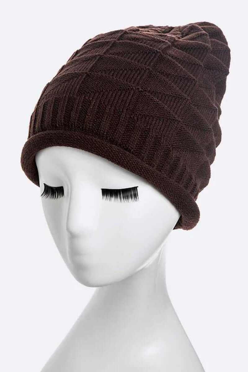 Warm ribbed unisex raised knit slouchy beanie in dark brown, perfect for cozy styling during fall and winter.