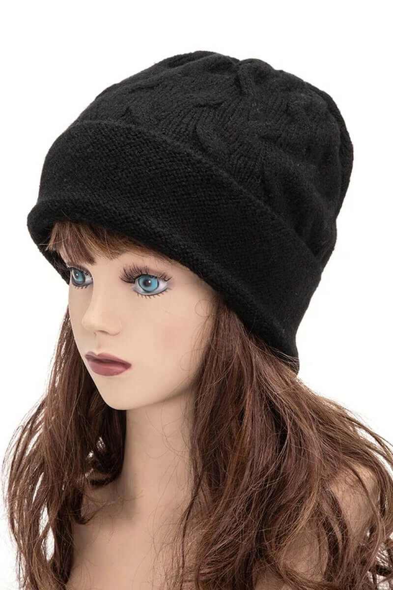 Black slouchy wool blend cuffed beanie displayed on a mannequin head, perfect for winter style.