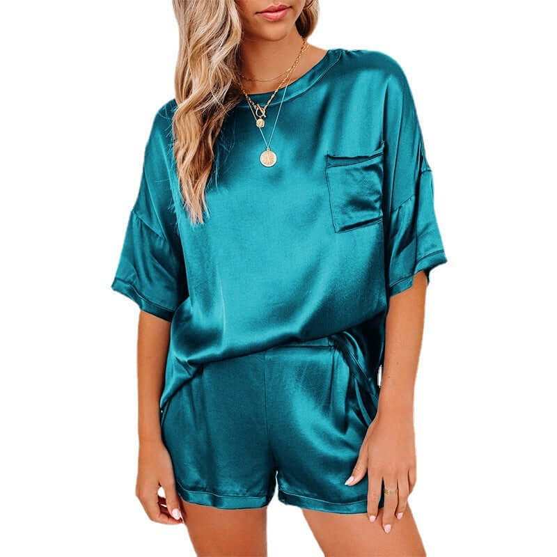 Teal short sleeve silk pajama set for women featuring a T-shirt and shorts, perfect for home leisurewear.