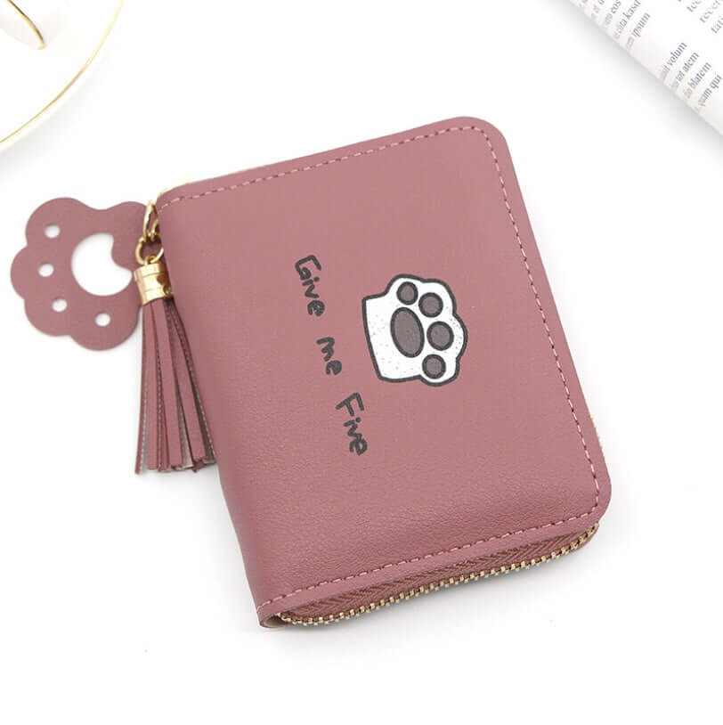 Cute pink cat paw zipper wallet with tassel and 'Give me Five' design, perfect for cat lovers.