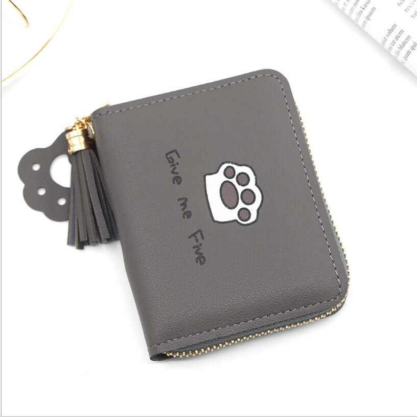 Cute grey cat paw wallet with zipper and tassel, perfect for cat lovers and trendy accessories.
