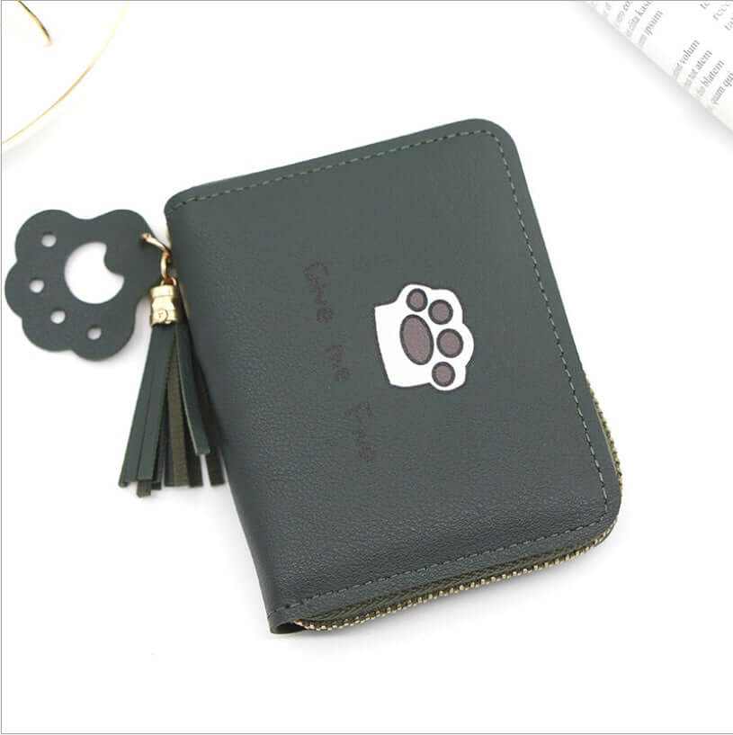 Cute cat paw wallet in dark green with a tassel and playful design, perfect for cat lovers and stylish women.