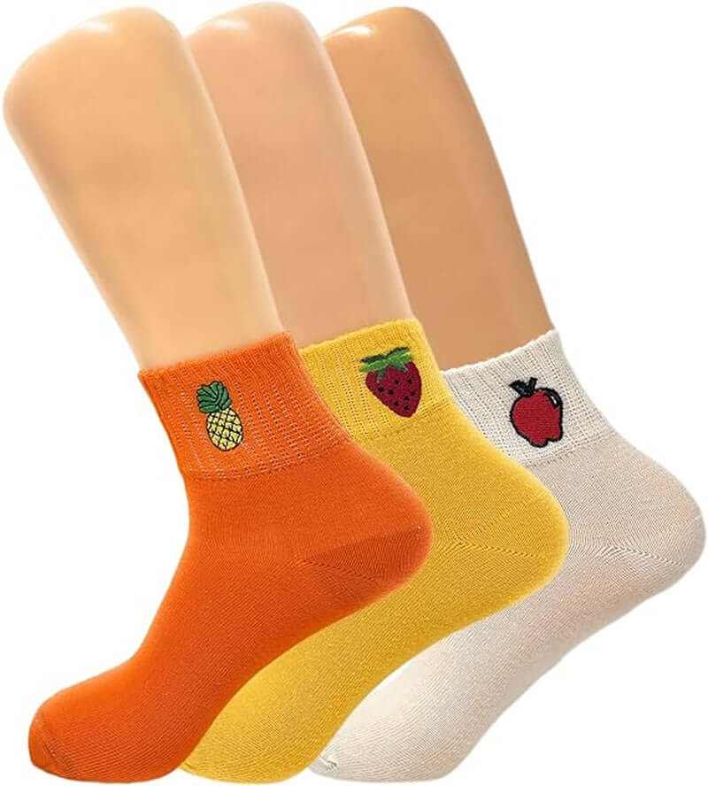 Set of three women's mini crew socks in orange, yellow, and white with fruit embroidery including pineapple, strawberry, and apple, breathable cotton blend, elastic cuff for secure fit