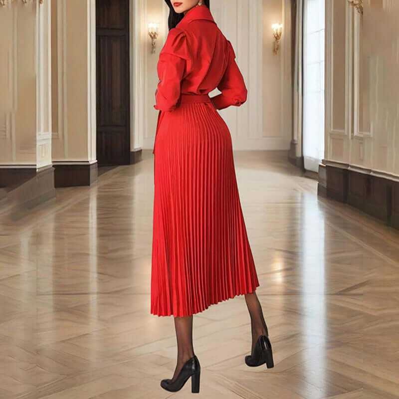 Elegant red pleated maxi dress with long sleeves and tie waist, perfect for casual and formal occasions.