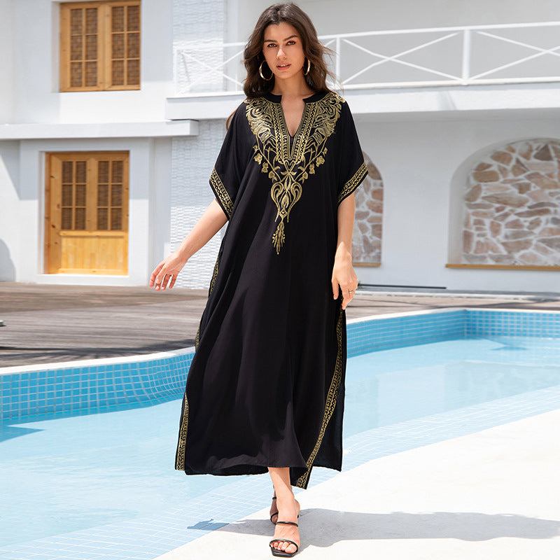 Elegant women’s embroidered rayon cover-up in black, perfect for beachwear or casual outings.