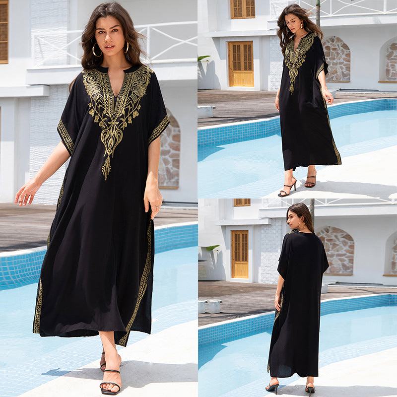 Women’s embroidered rayon cover-up in black with intricate design, perfect for swimming and casual outings.