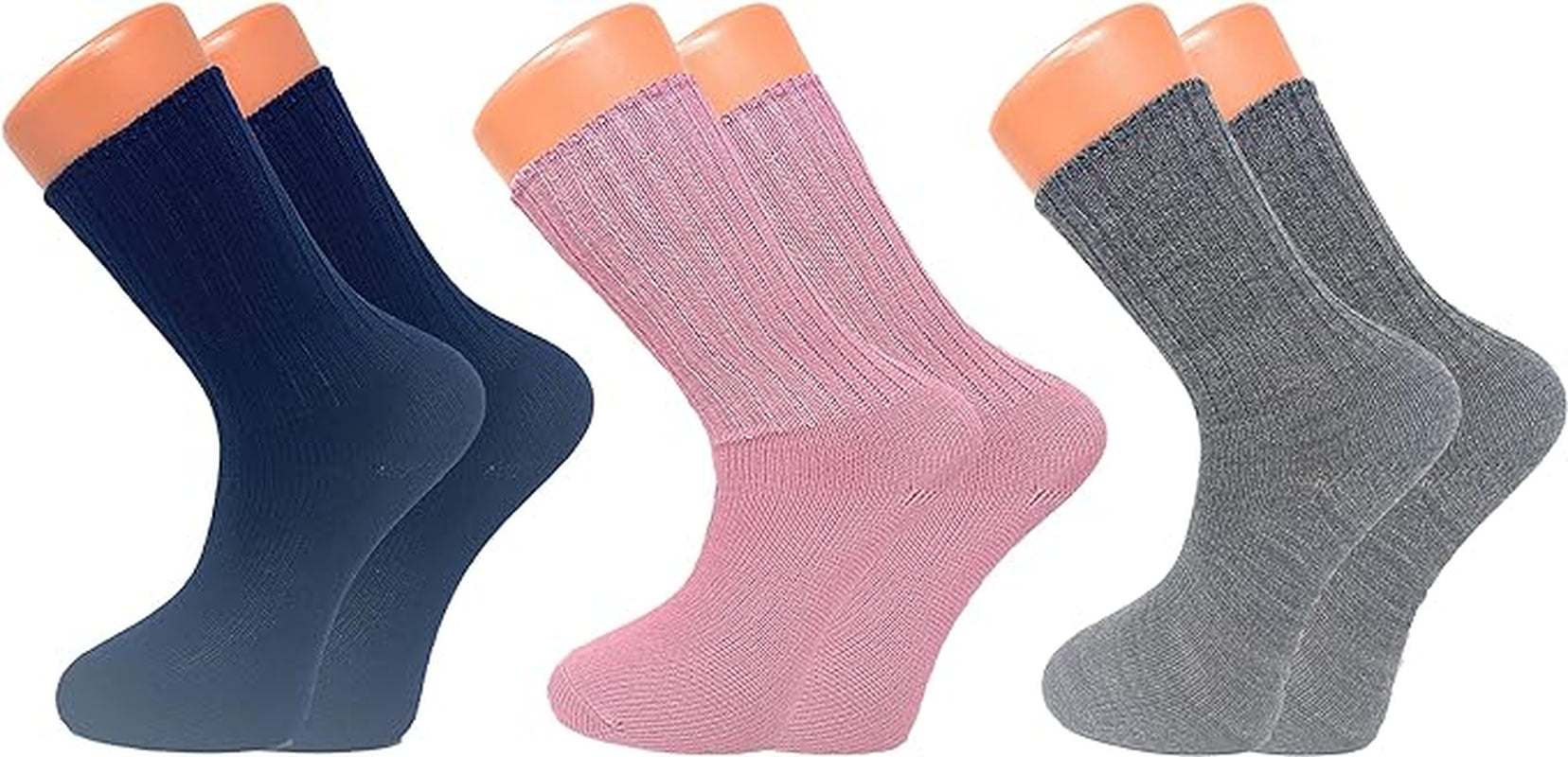 Three pairs of cozy women's loose-fitting crew socks in navy blue, pink, and gray colors