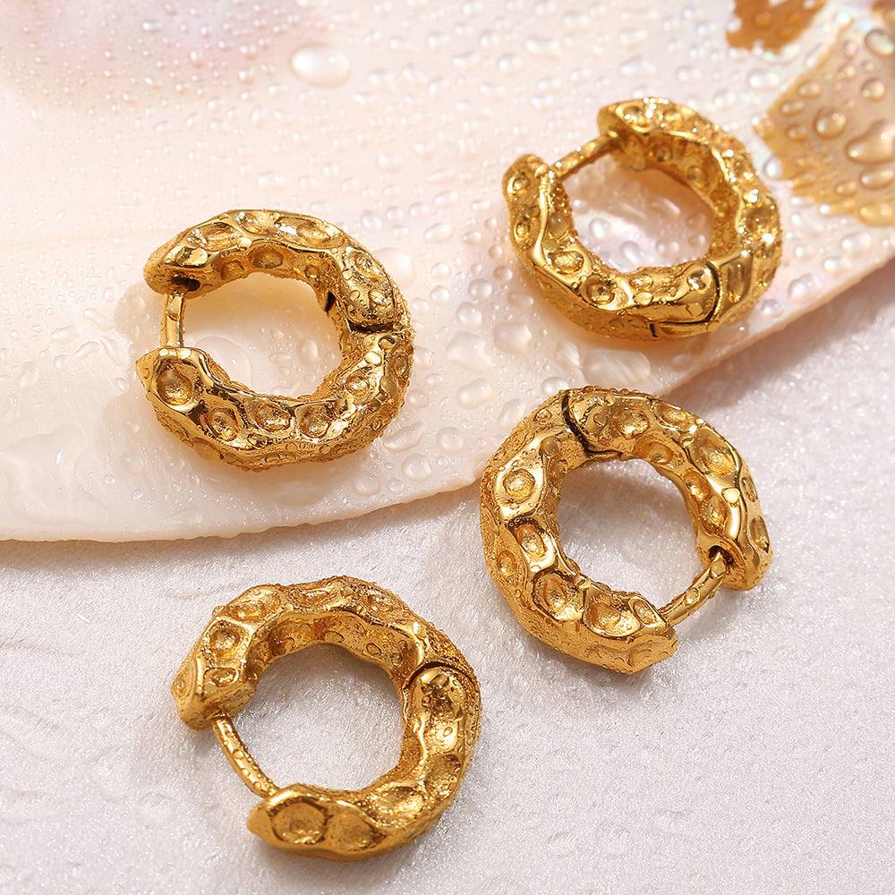 Gold minimalist retro circle earrings for women with textured design and titanium steel material.