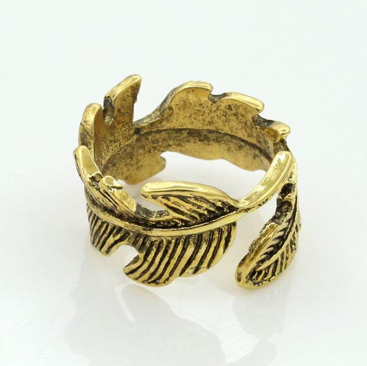 Antique gold plated women’s personality leaf style ring with vintage feather design