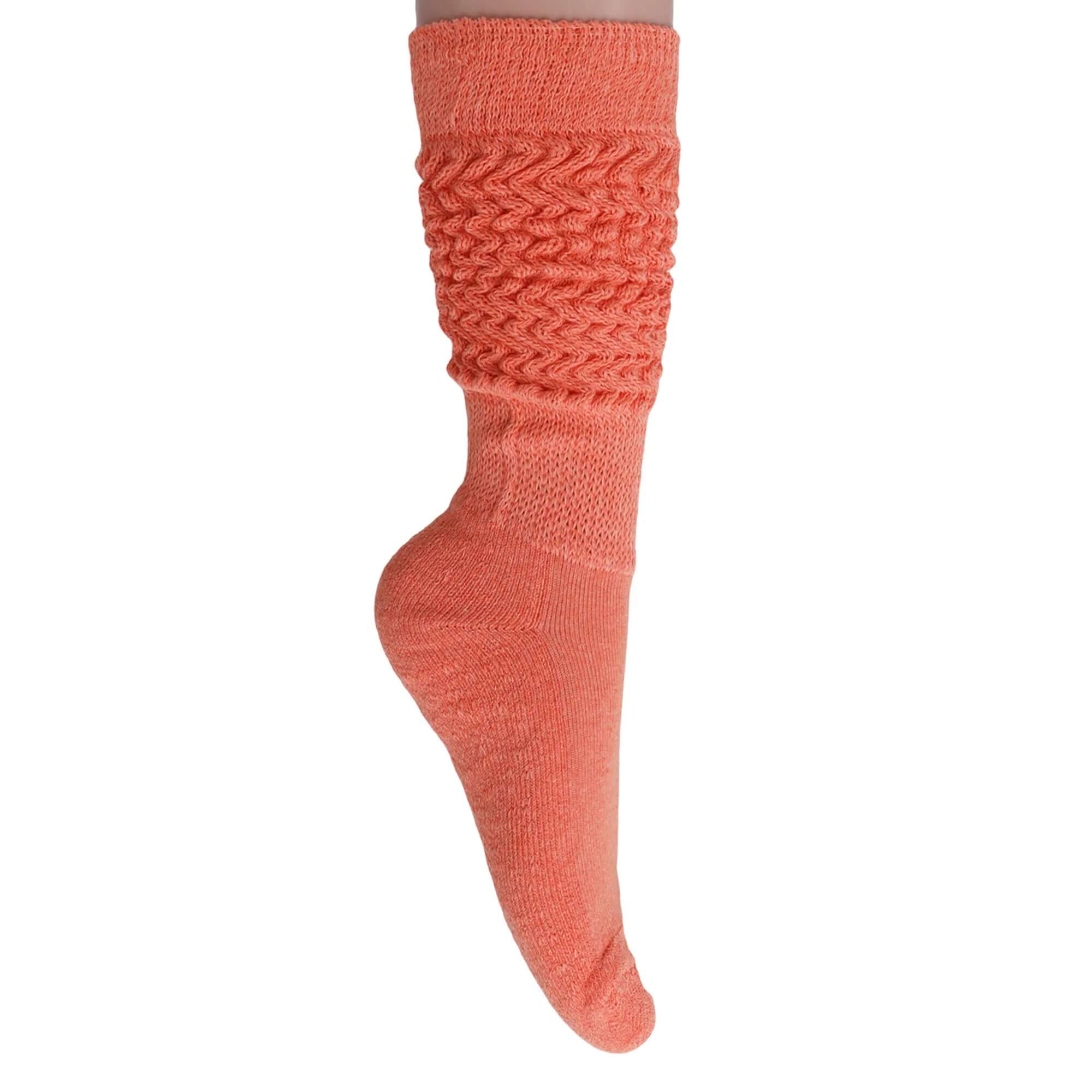 Soft coral slouchy scrunch sock, ideal for knee-high or crew wear, made from premium cotton blend.