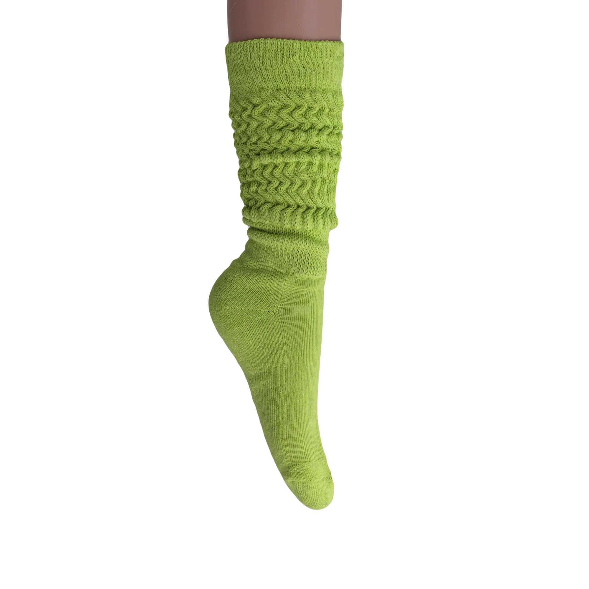 Women's slouchy scrunch socks in vibrant green, knee-high style, made from soft cotton blend for comfort and versatility.