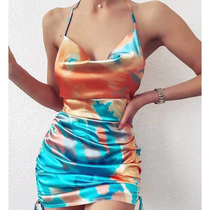 Women's backless tie-dye suspender mini dress featuring vibrant colors and A-line fit.