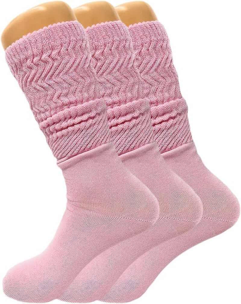 Three pairs of pink women's slouch knee high socks, featuring a cozy design for all-day comfort and style.