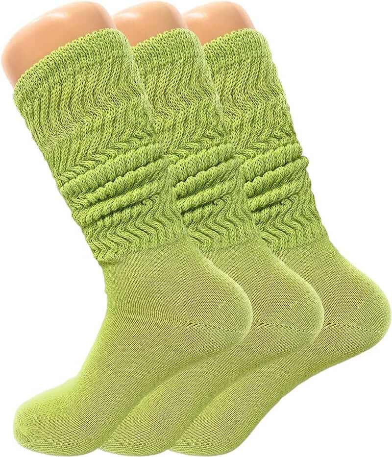 Three pairs of women's slouch knee-high socks in vibrant green, featuring a relaxed and trendy design.
