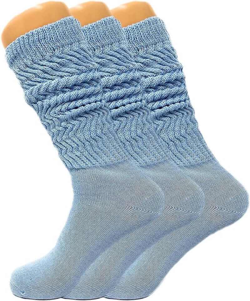 Three pairs of women's slouch knee high socks in light blue, featuring a trendy slouchy design for comfort and style.