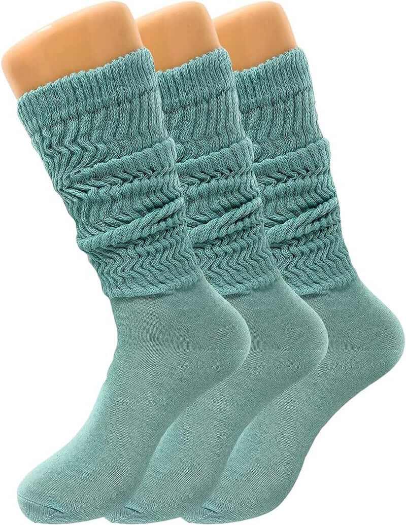 Three pairs of women's slouch knee high socks in a soft teal color, perfect for all-season wear.