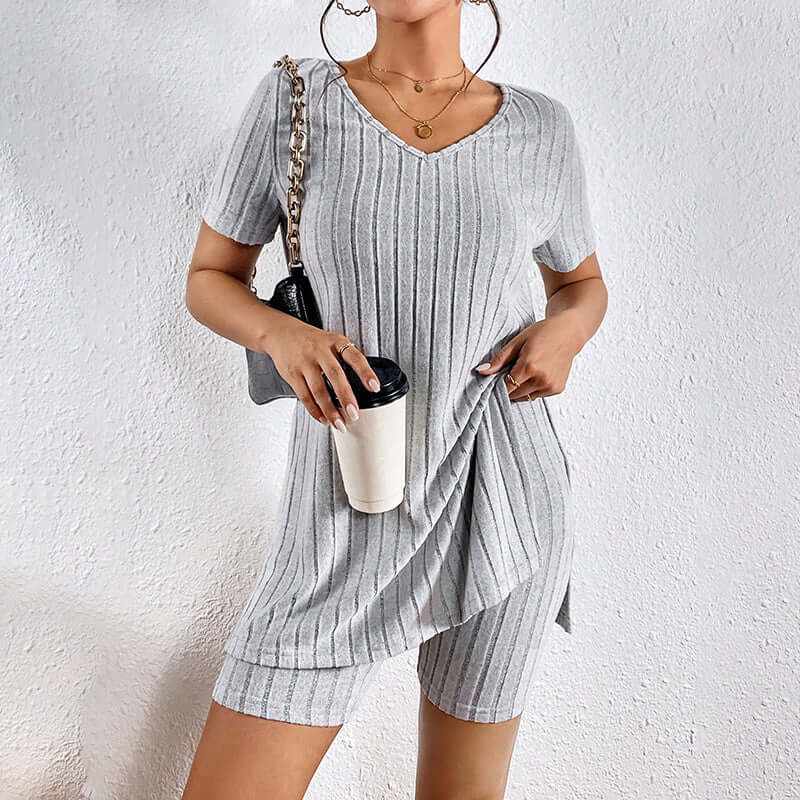 Womens 2-piece lounge set featuring a gray ribbed knit V-neck tee and shorts, perfect for summer comfort and casual wear.
